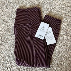 Athleta maroon striped 7/8 tights with side pockets